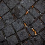 street, cigarette butt, pollution, bar, party, dirt, flagstones, asphalt, flooring, cigarette butt, cigarette butt, cigarette butt, cigarette butt, cigarette butt